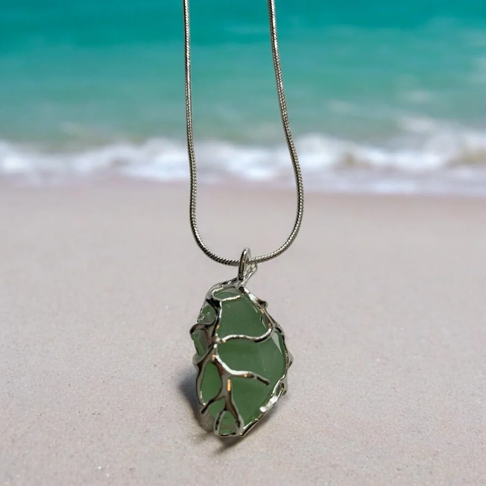 Genuine Caribbean Sea Glass Wrapped in Nature-Inspired Silver Plated Cage